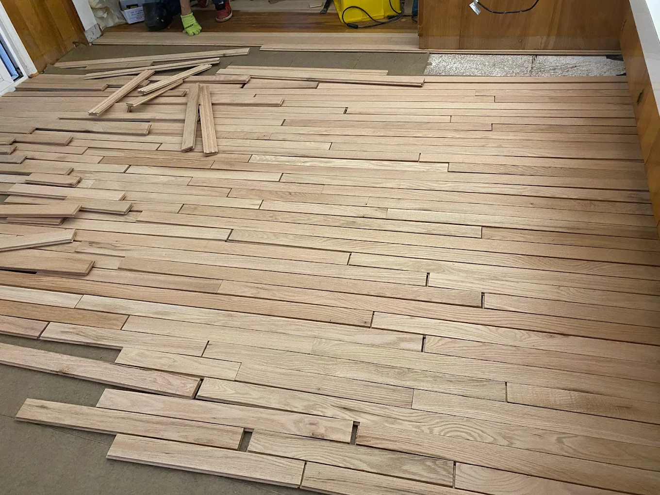 Hardwood floor repair in Portland, OR: Board weaving & water damage