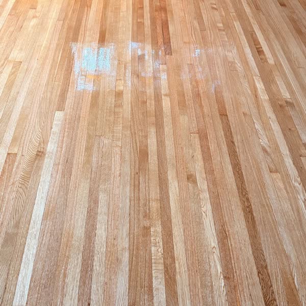 Meticulously restored 1913 old-growth hardwood floors with Bona NaturalSeal in Portland